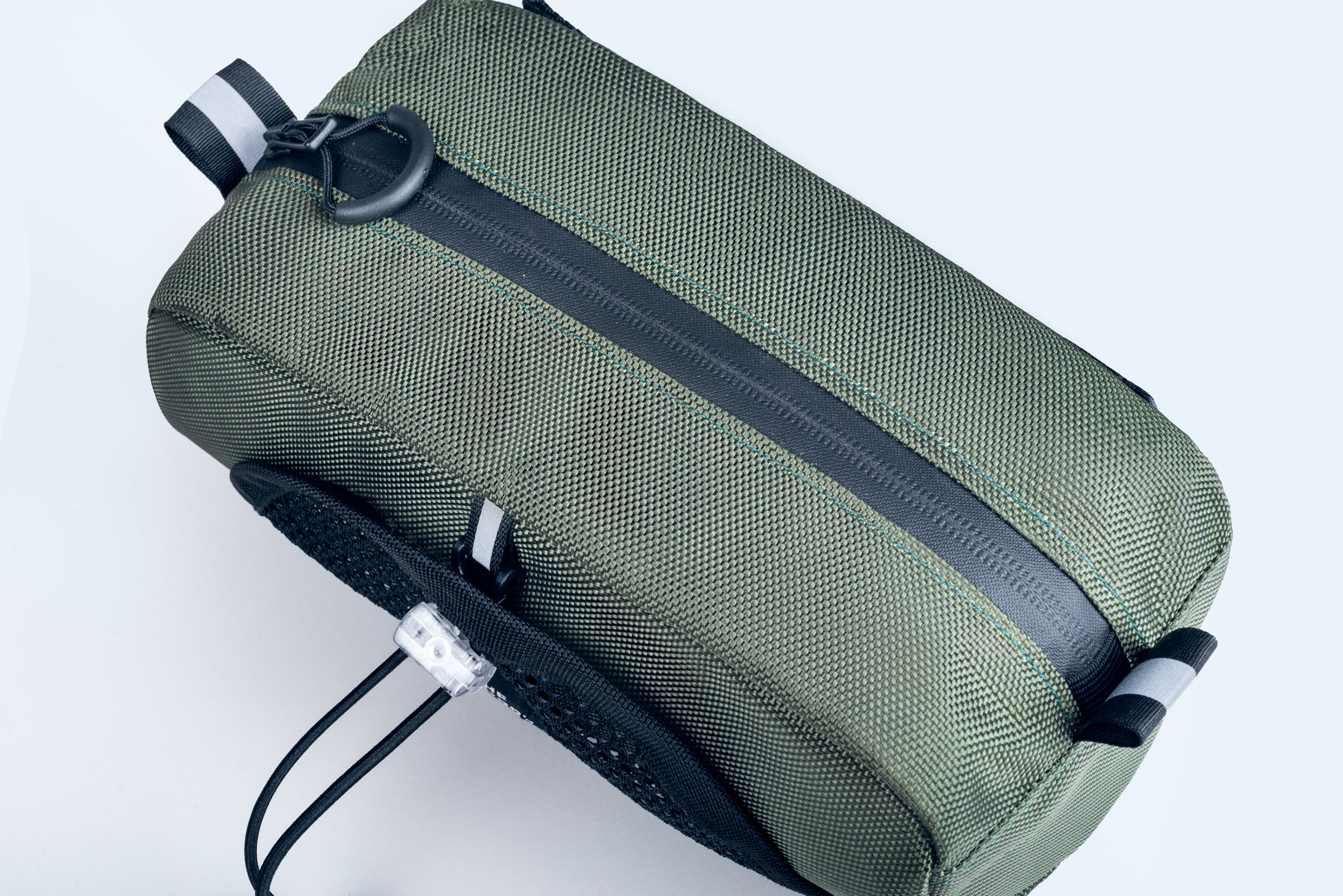 Reflective tabs and water resistant zip